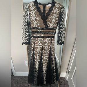 Black embroidered dress with cream underlay xxs